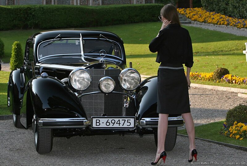 Woman with classic car