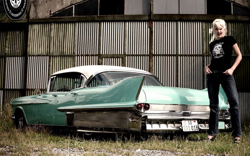 Woman with classic car