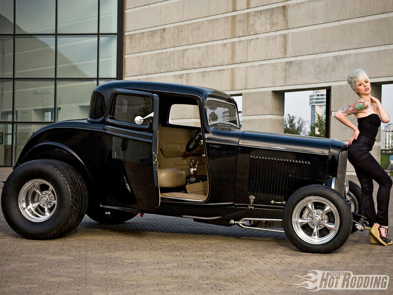 woman with classic hot rod car