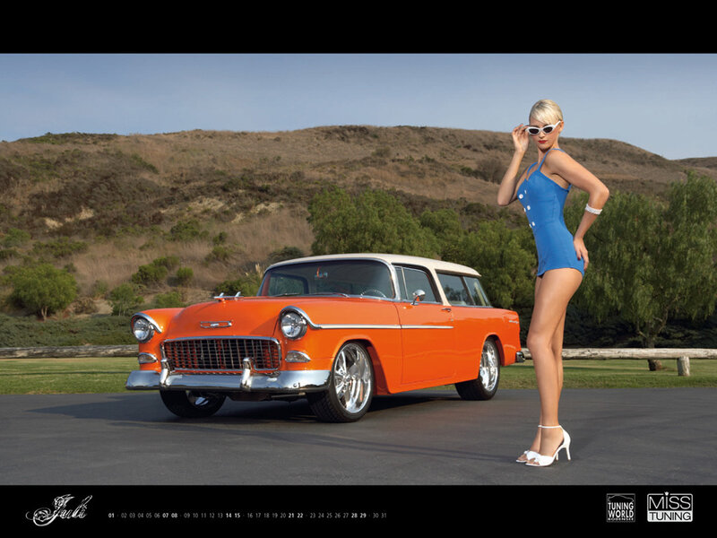 Woman with classic orange car