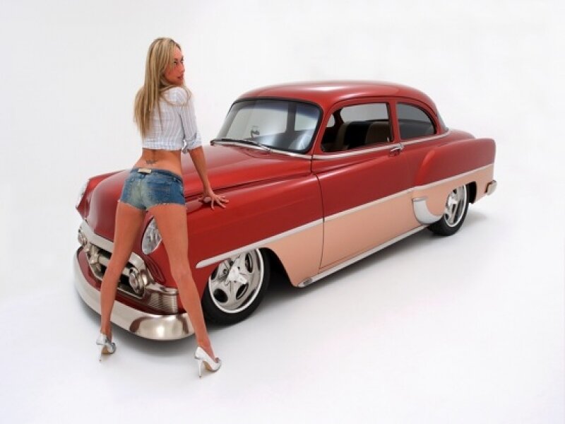 Woman with classic red car