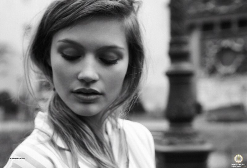 Woman with Closed Eyes — Black, Contemplative, Photograph, Building
