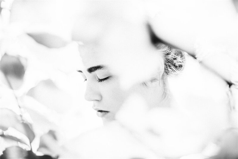 Woman with Closed Eyes — Black, Serene, Photograph, Leaves