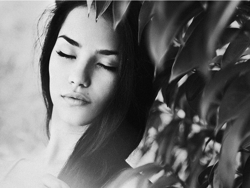 Woman with Closed Eyes — Black, Serene, Photograph, Plant