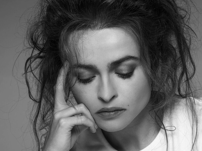 woman with closed eyes in black and white