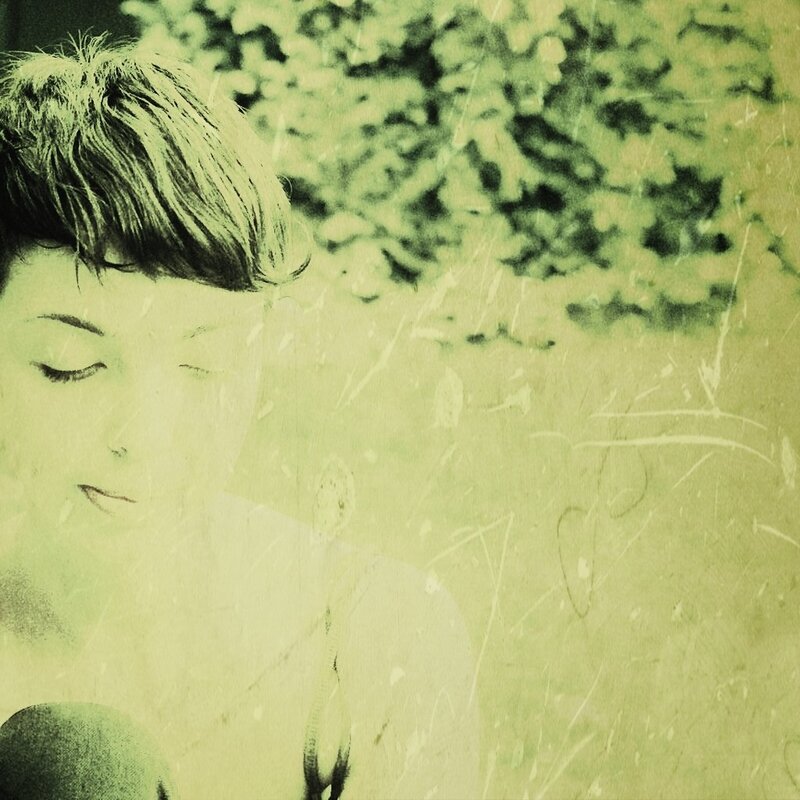 woman with closed eyes in green light