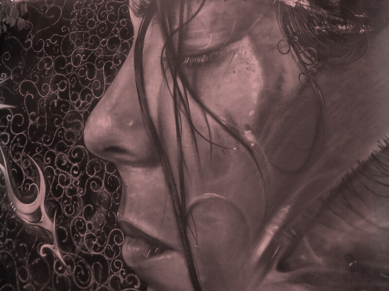 woman with closed eyes in profile