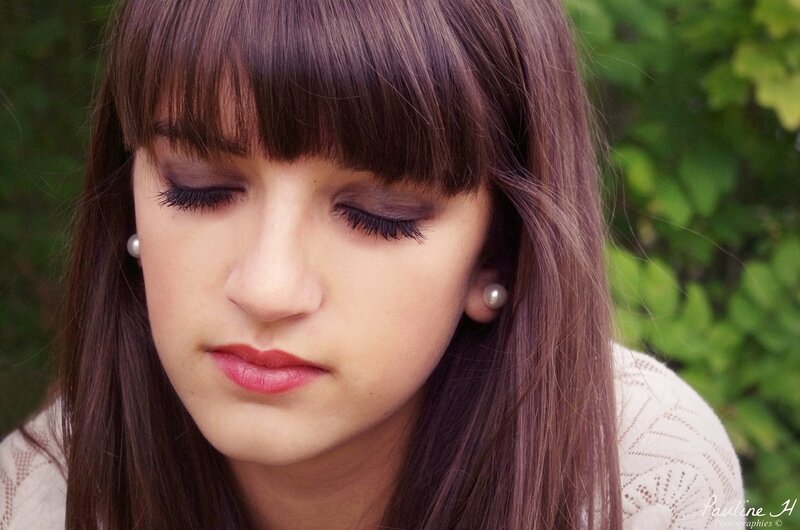 woman with closed eyes outdoors