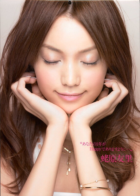 Woman with closed eyes smiling