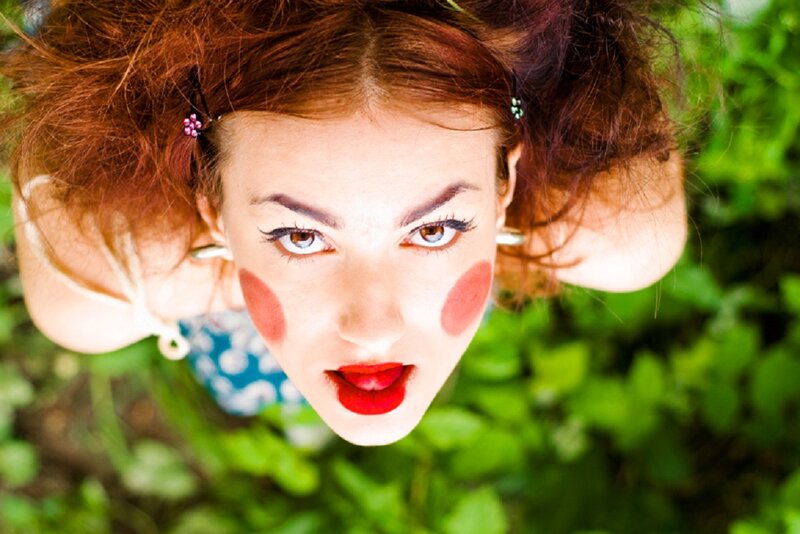 Woman with Clown Makeup — Red