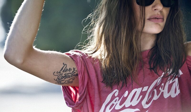 woman with coca-cola shirt