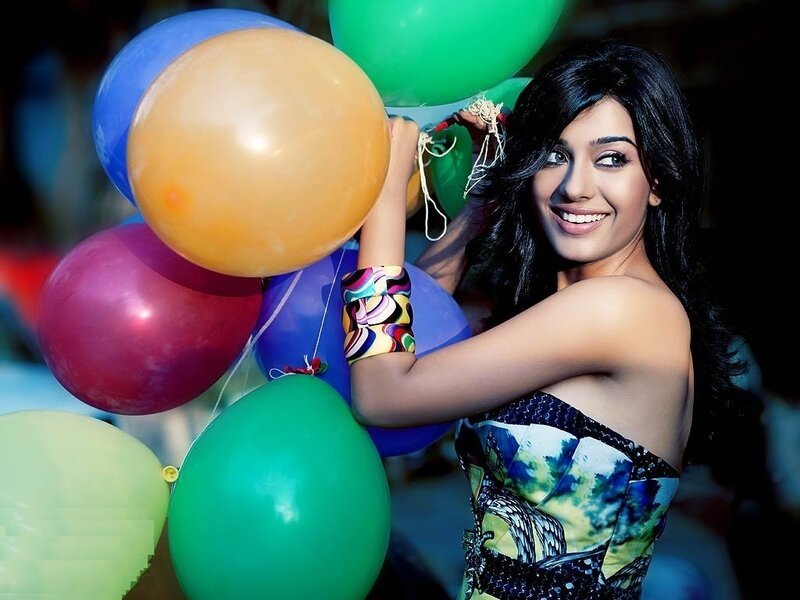 Woman with colorful balloons