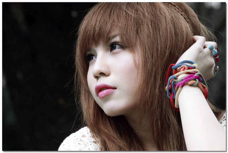 woman with colorful bracelets