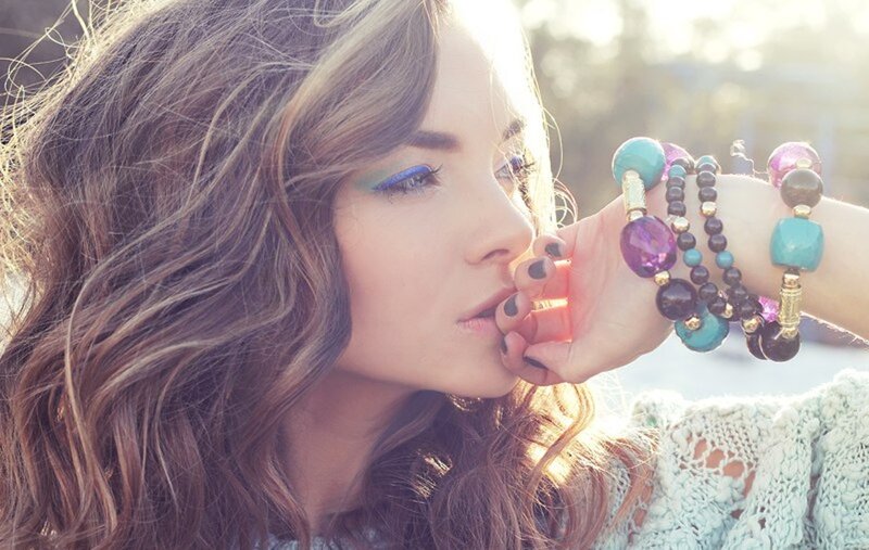 Woman with Colorful Bracelets — Brown