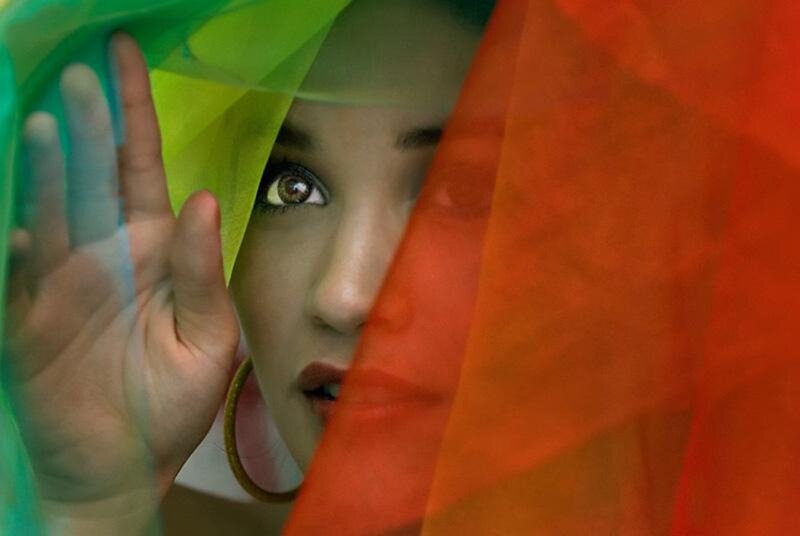 Woman with Colorful Fabric