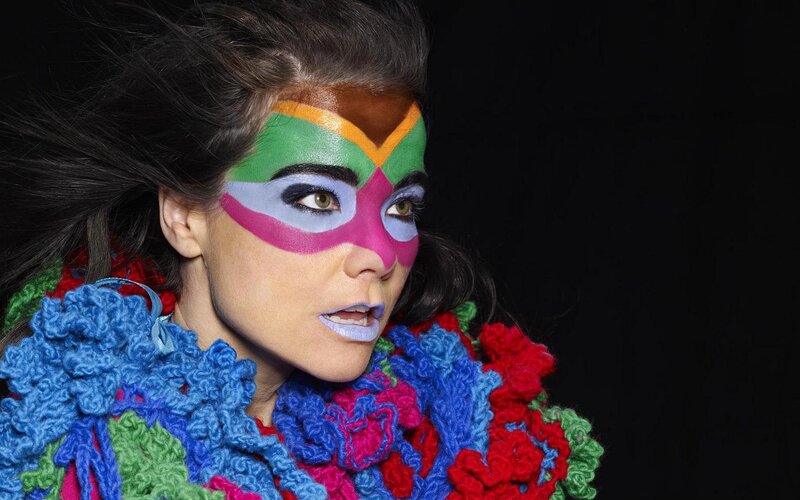 woman with colorful face paint