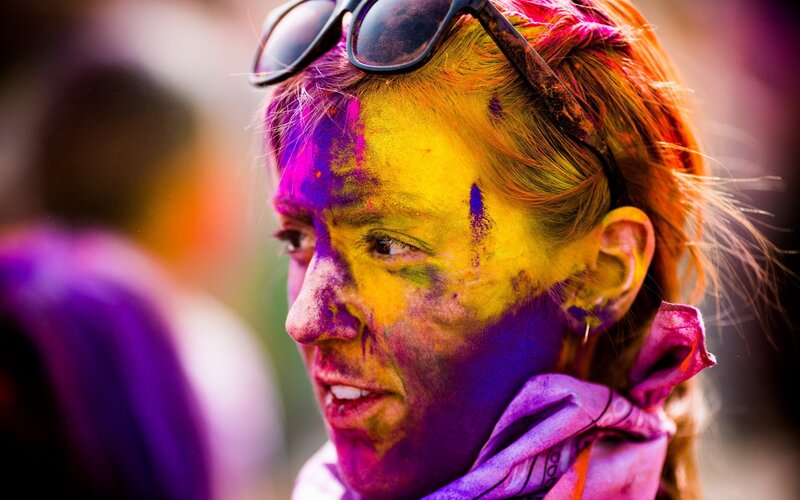 woman with colorful face paint