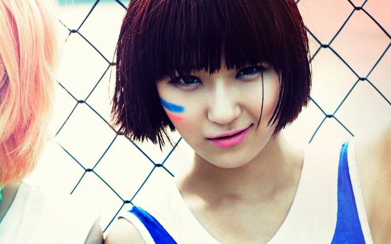 woman with colorful face paint