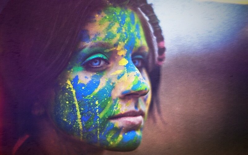 woman with colorful face paint