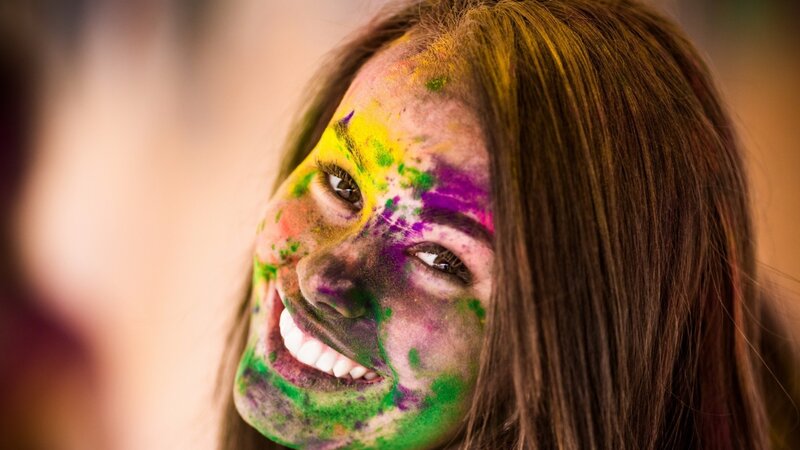 woman with colorful face paint