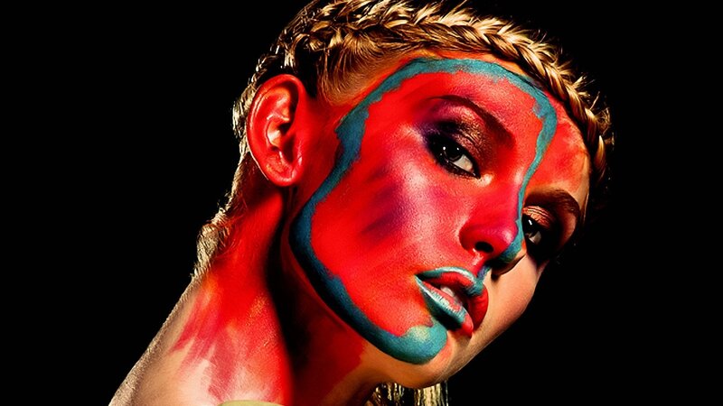 woman with colorful face paint