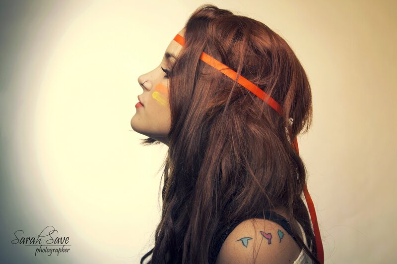 woman with colorful face paint