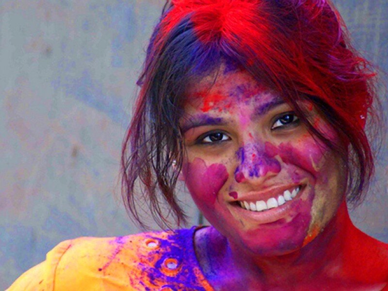 woman with colorful face paint