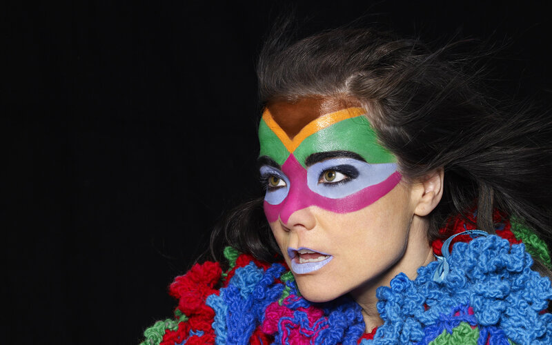 woman with colorful face paint