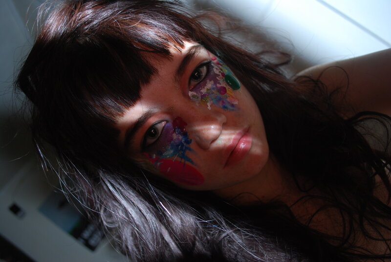 woman with colorful face paint