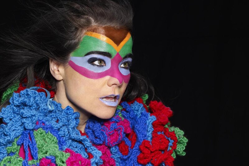 woman with colorful face paint