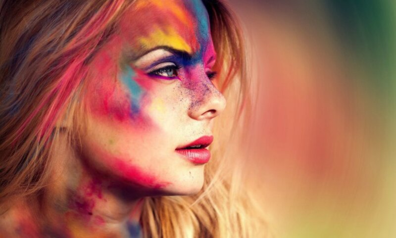 Woman with Colorful Face Paint — Red, Dramatic, Photograph