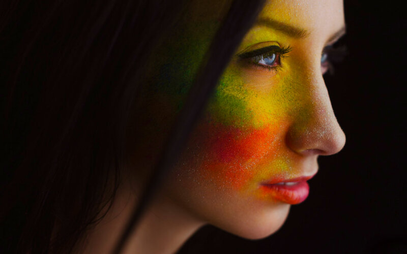 Woman with Colorful Face Paint — Yellow