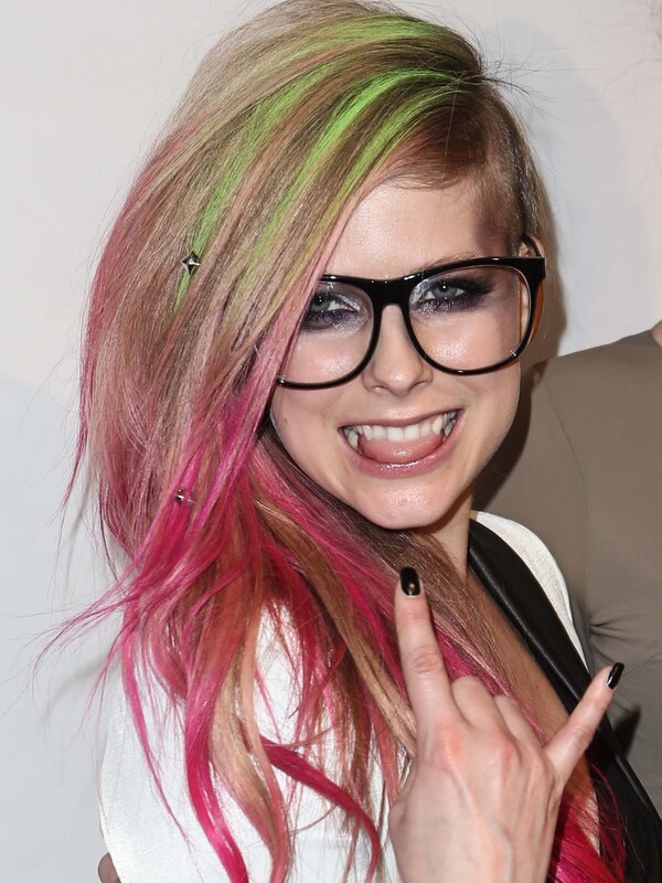 woman with colorful hair and glasses