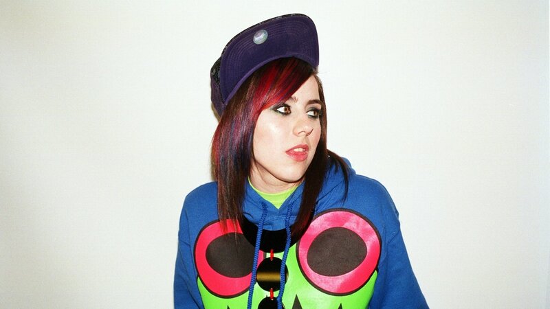 woman with colorful hair and hoodie