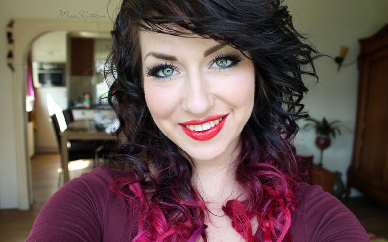 woman with colorful hair and makeup