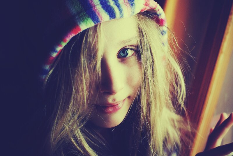 woman with colorful hat