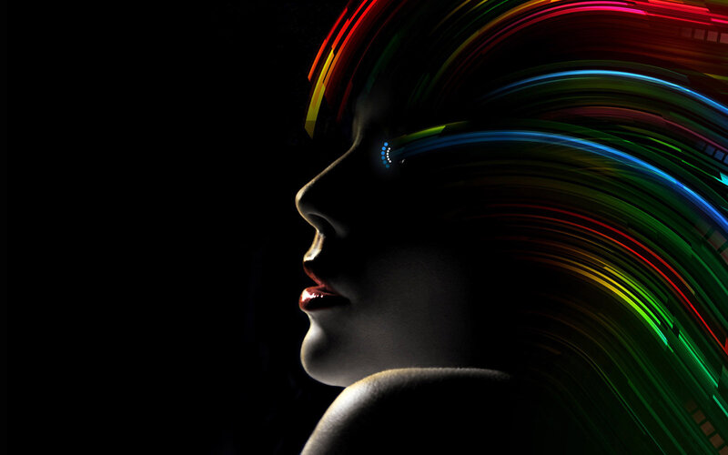 woman with colorful light trails
