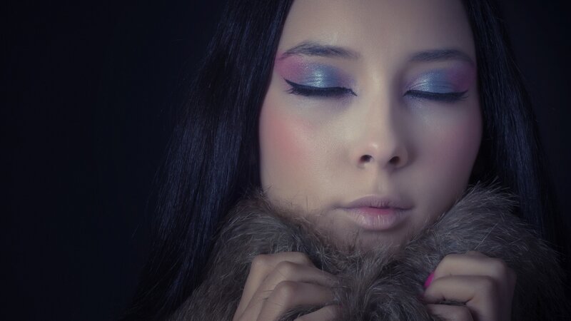 woman with colorful makeup