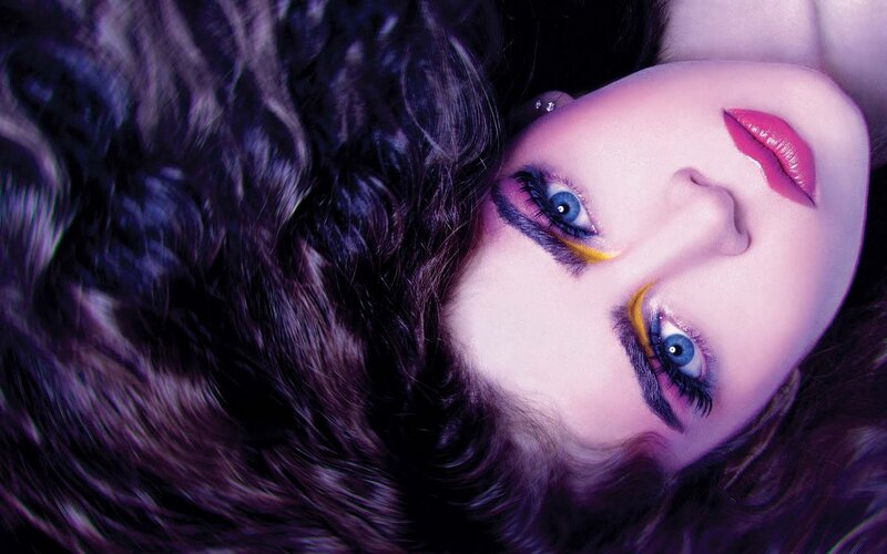 woman with colorful makeup