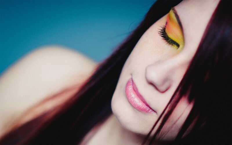 woman with colorful makeup