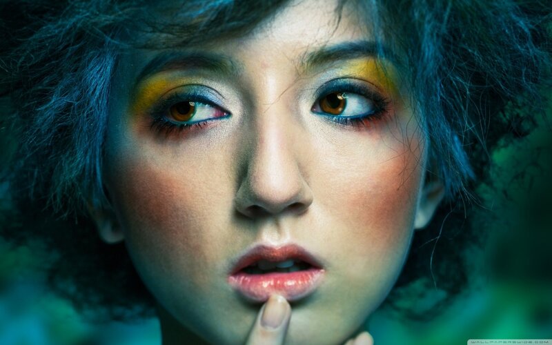 woman with colorful makeup