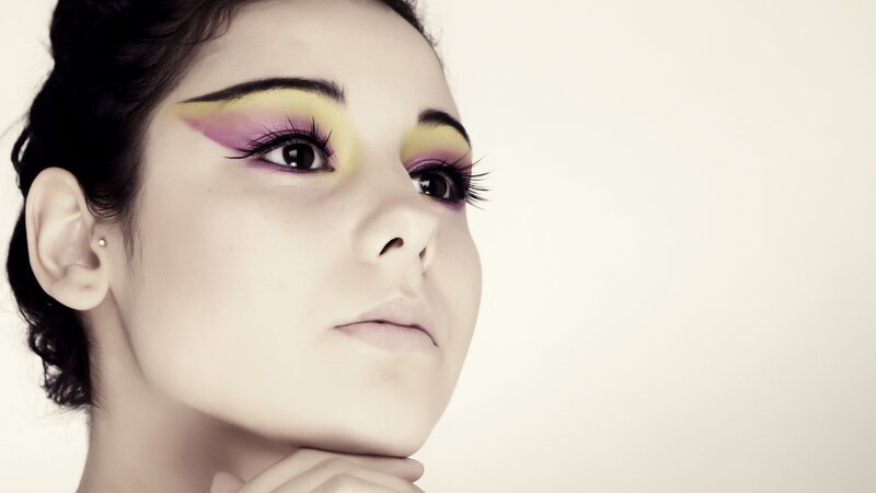 woman with colorful makeup