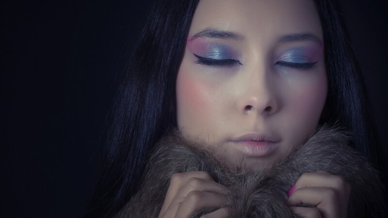 woman with colorful makeup