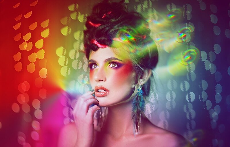 Woman with Colorful Makeup — Red, Dramatic, Photograph, Feather Earrings