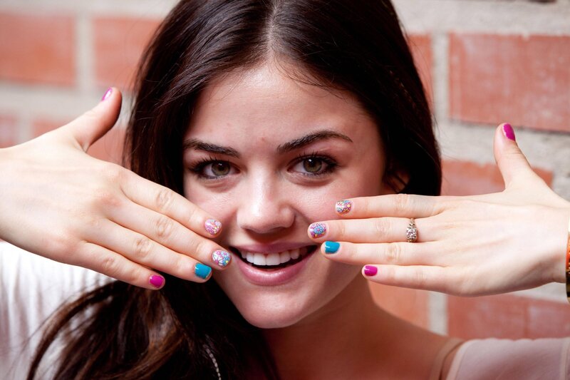 woman with colorful nail art