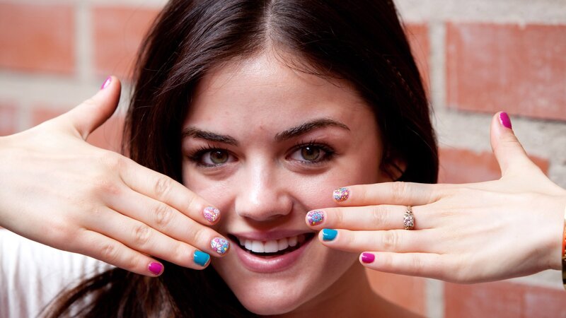 woman with colorful nail art