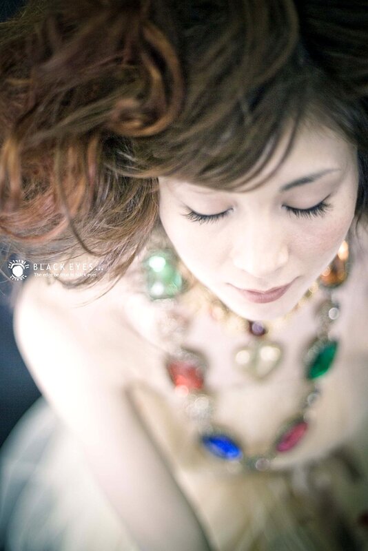 woman with colorful necklace