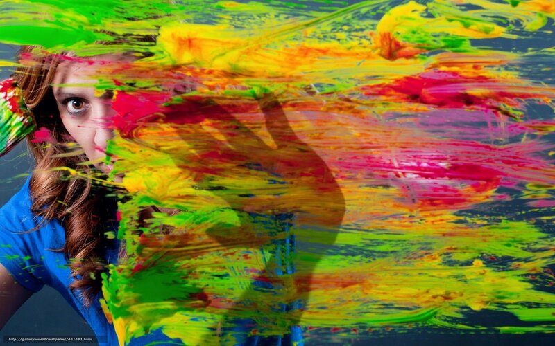 woman with colorful paint splatters