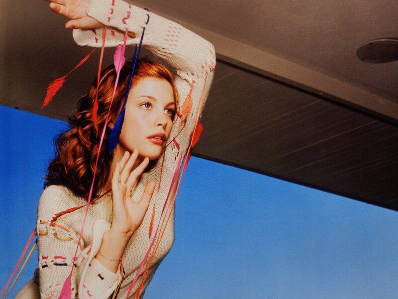woman with colorful ribbons