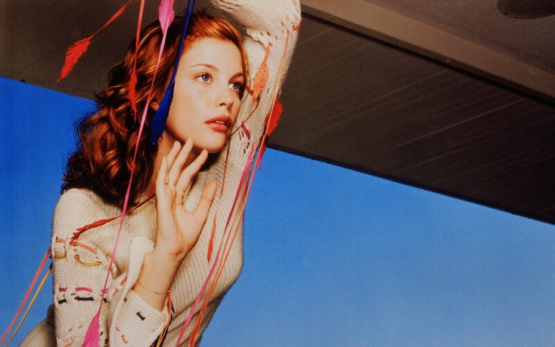 woman with colorful ribbons